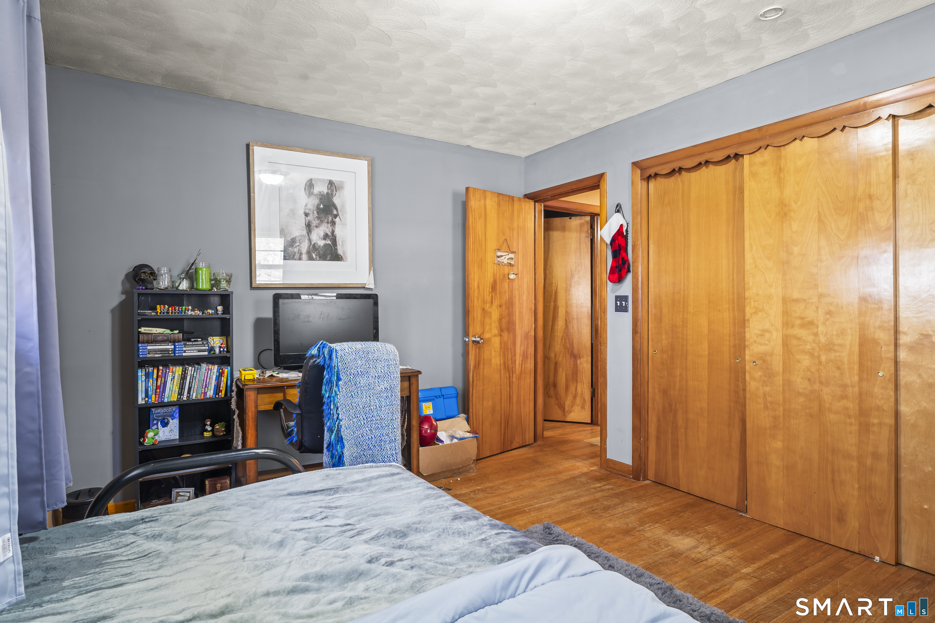 76 Lucas Park Road Norwich, CT 06360 - Photo 22 of 39 a bedroom with furniture and a window