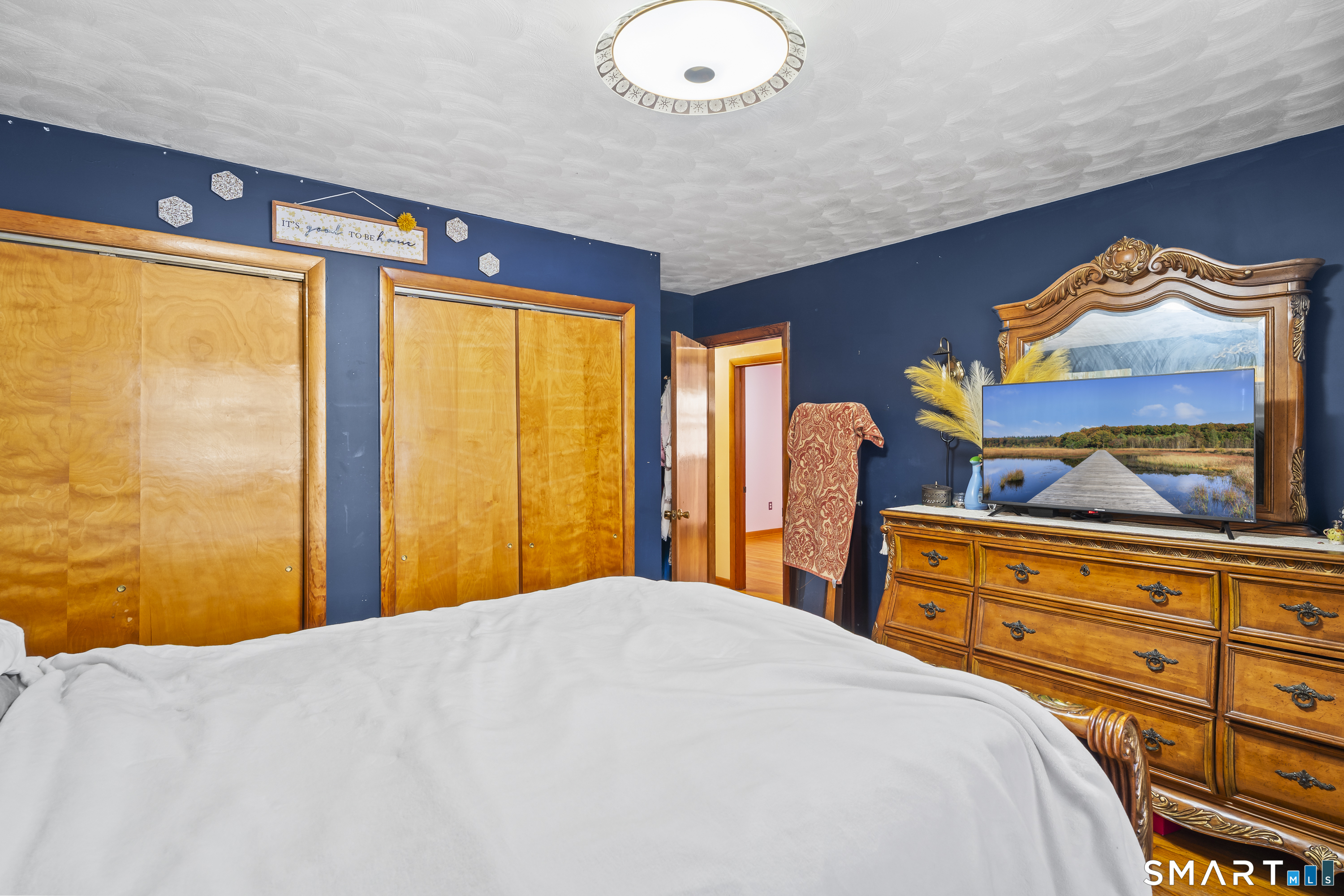 76 Lucas Park Road Norwich, CT 06360 - Photo 24 of 39 a bedroom with a bed and a window