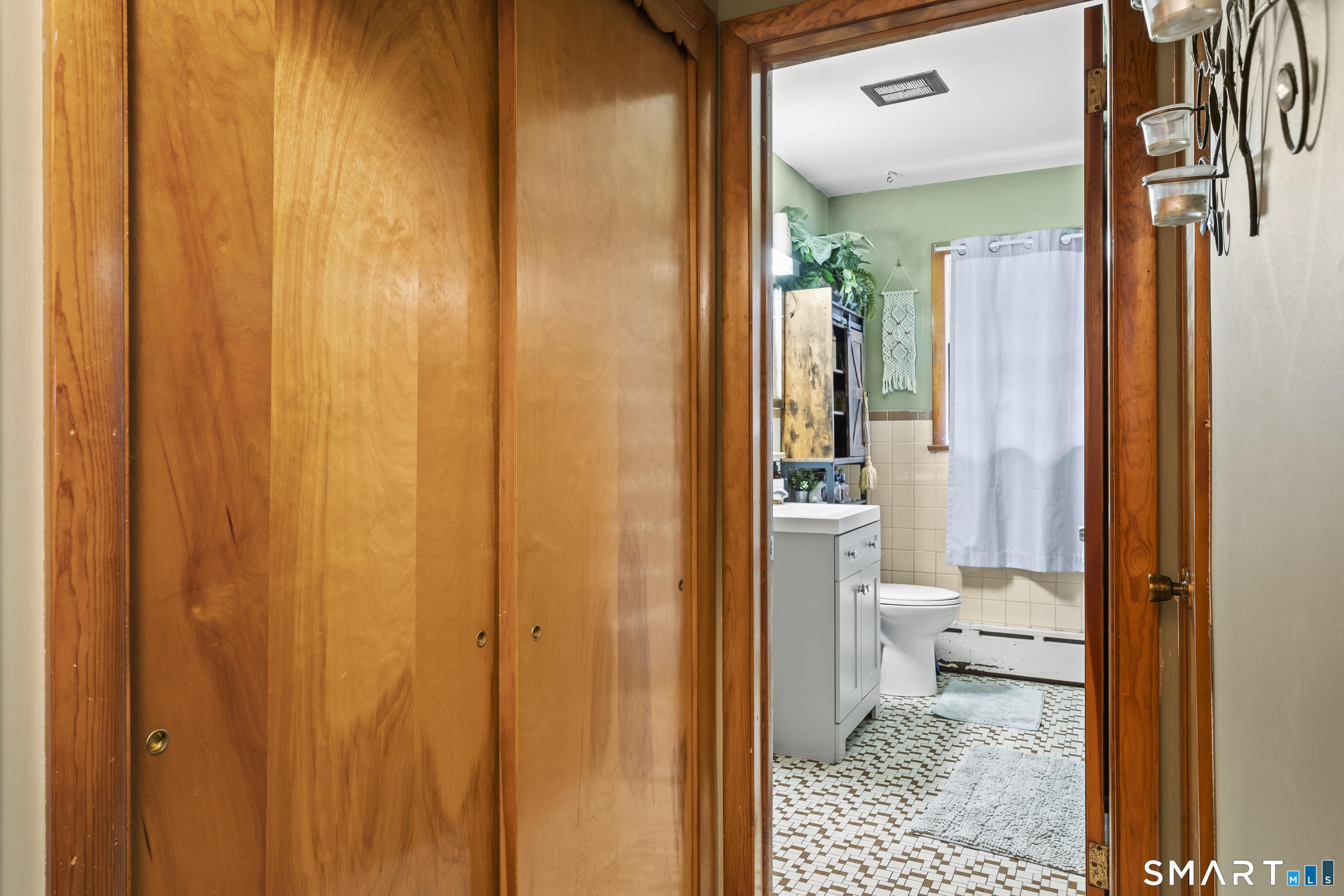 76 Lucas Park Road Norwich, CT 06360 - Photo 25 of 39 a bathroom with a granite countertop shower and a toilet