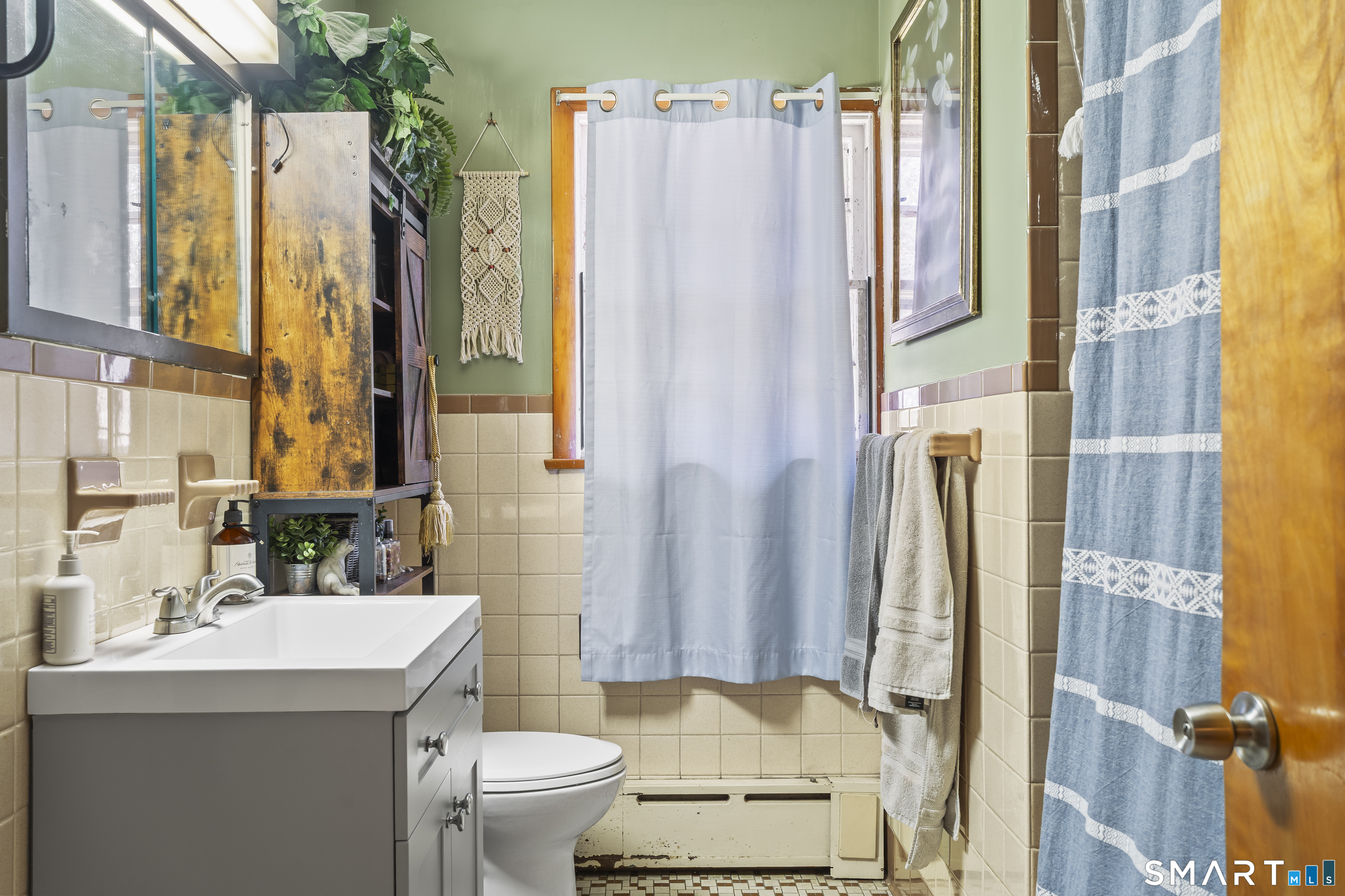 76 Lucas Park Road Norwich, CT 06360 - Photo 26 of 39 a bathroom with a sink toilet and shower