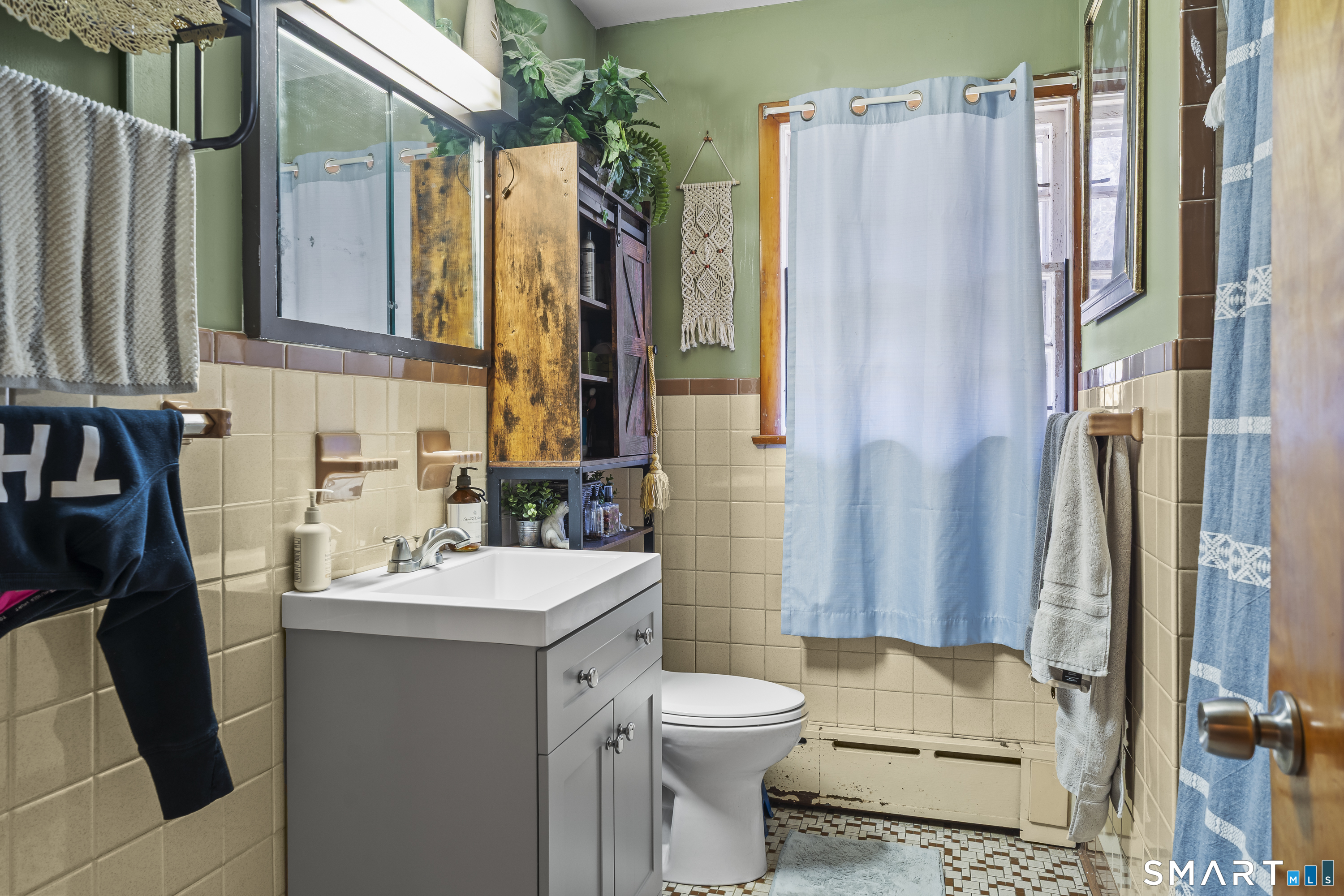 76 Lucas Park Road Norwich, CT 06360 - Photo 27 of 39 a bathroom with a sink toilet and shower