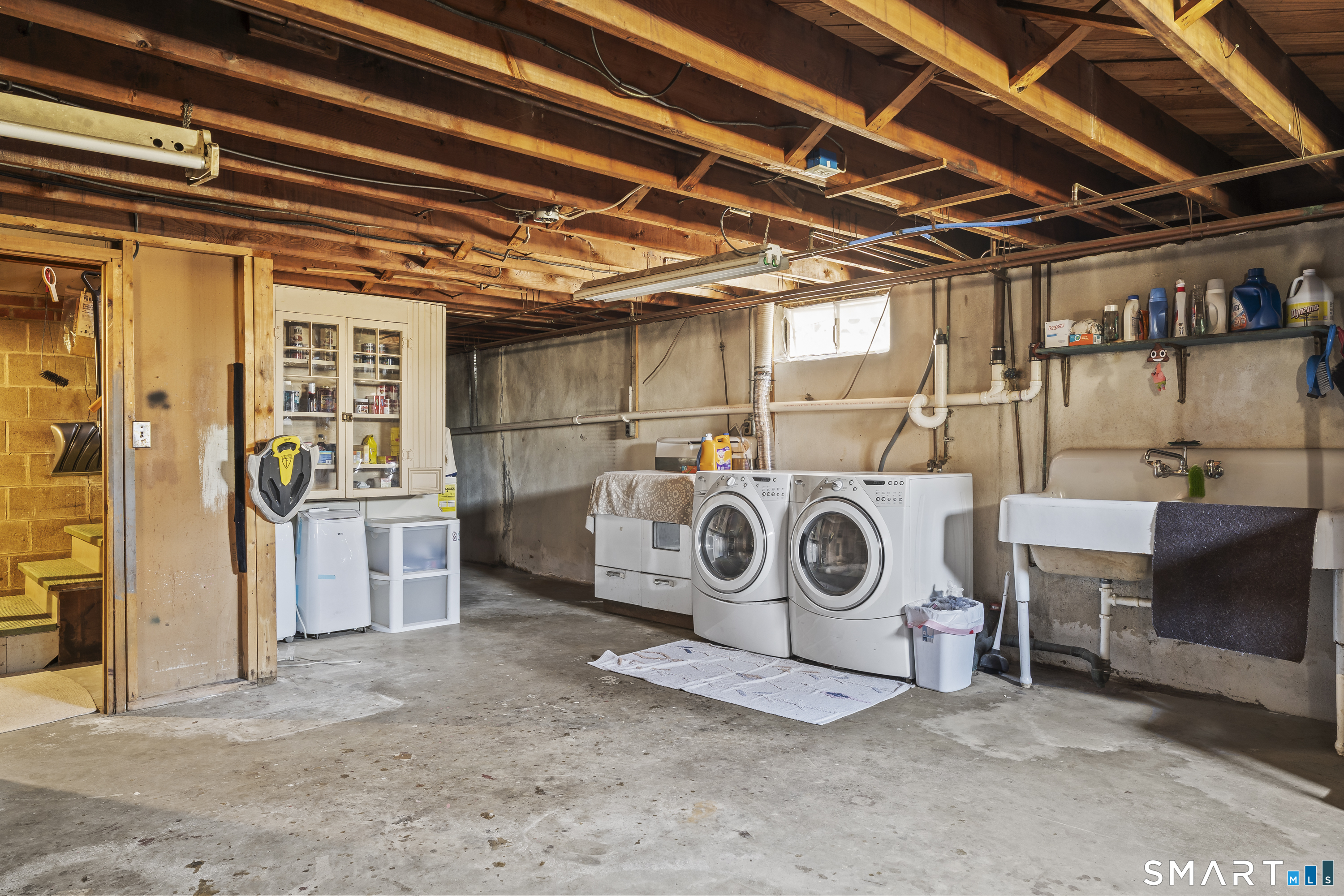 76 Lucas Park Road Norwich, CT 06360 - Photo 30 of 39 a utility room with dryer and washer