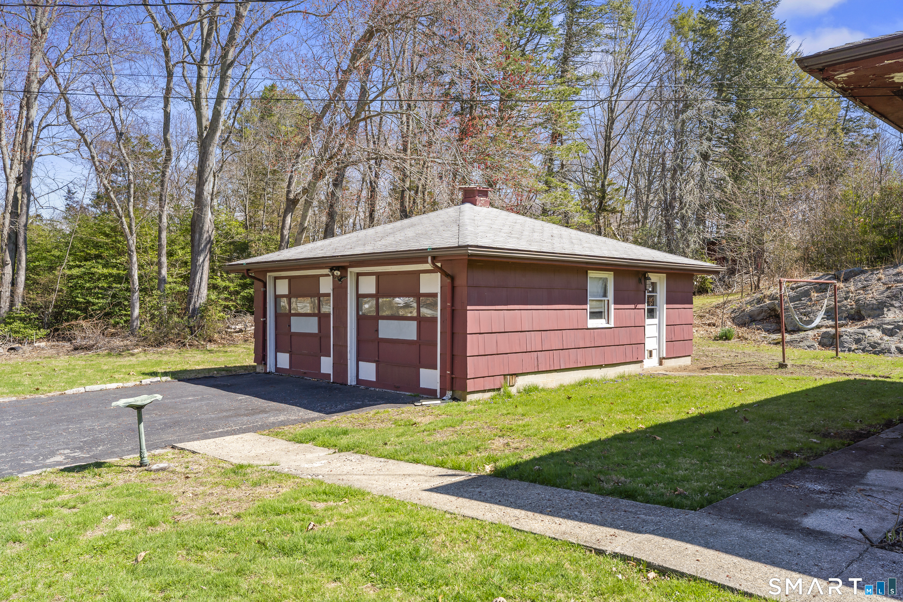 76 Lucas Park Road Norwich, CT 06360 - Photo 6 of 39 a front view of a house with garden