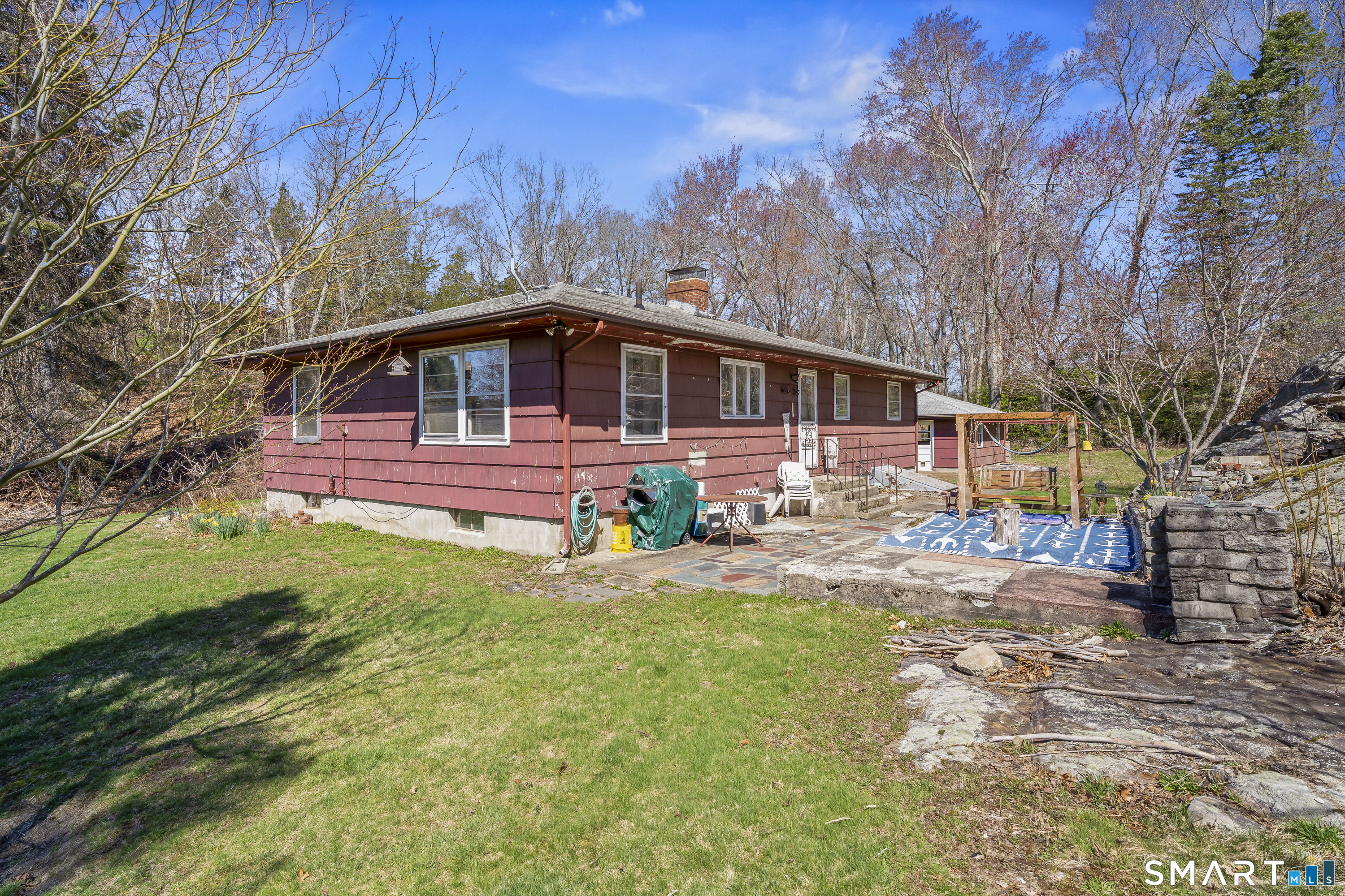 76 Lucas Park Road Norwich, CT 06360 - Photo 7 of 39 a front view of a house with a yard
