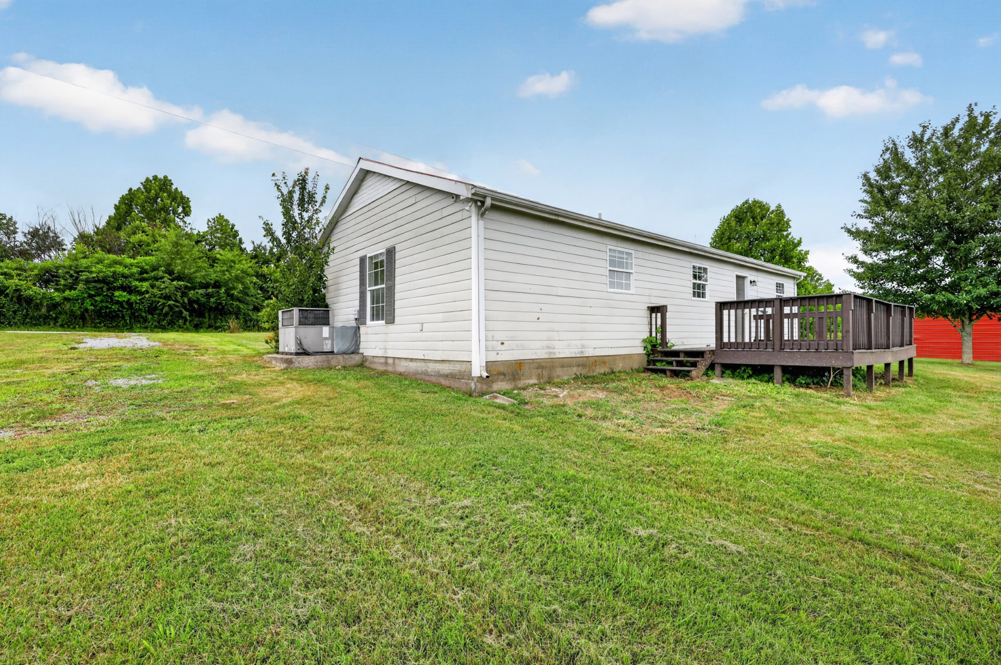 120 Driver Road Lafayette, TN 37083 - Photo 28 of 39 a view of a house with a backyard