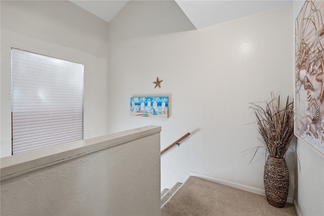 2003 North Fulton Beach Road, Unit 34 34 Rockport, TX 78382 - Photo 16 of 38 a view of a hallway with a potted plant