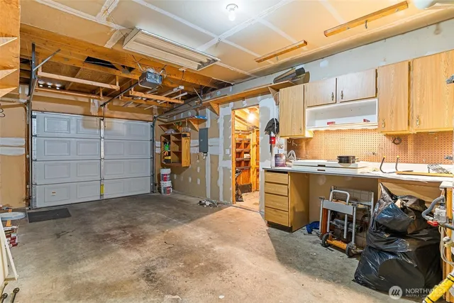 a view of a room with wooden walls