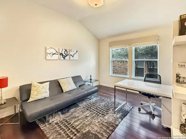 a living room with a couch and a table