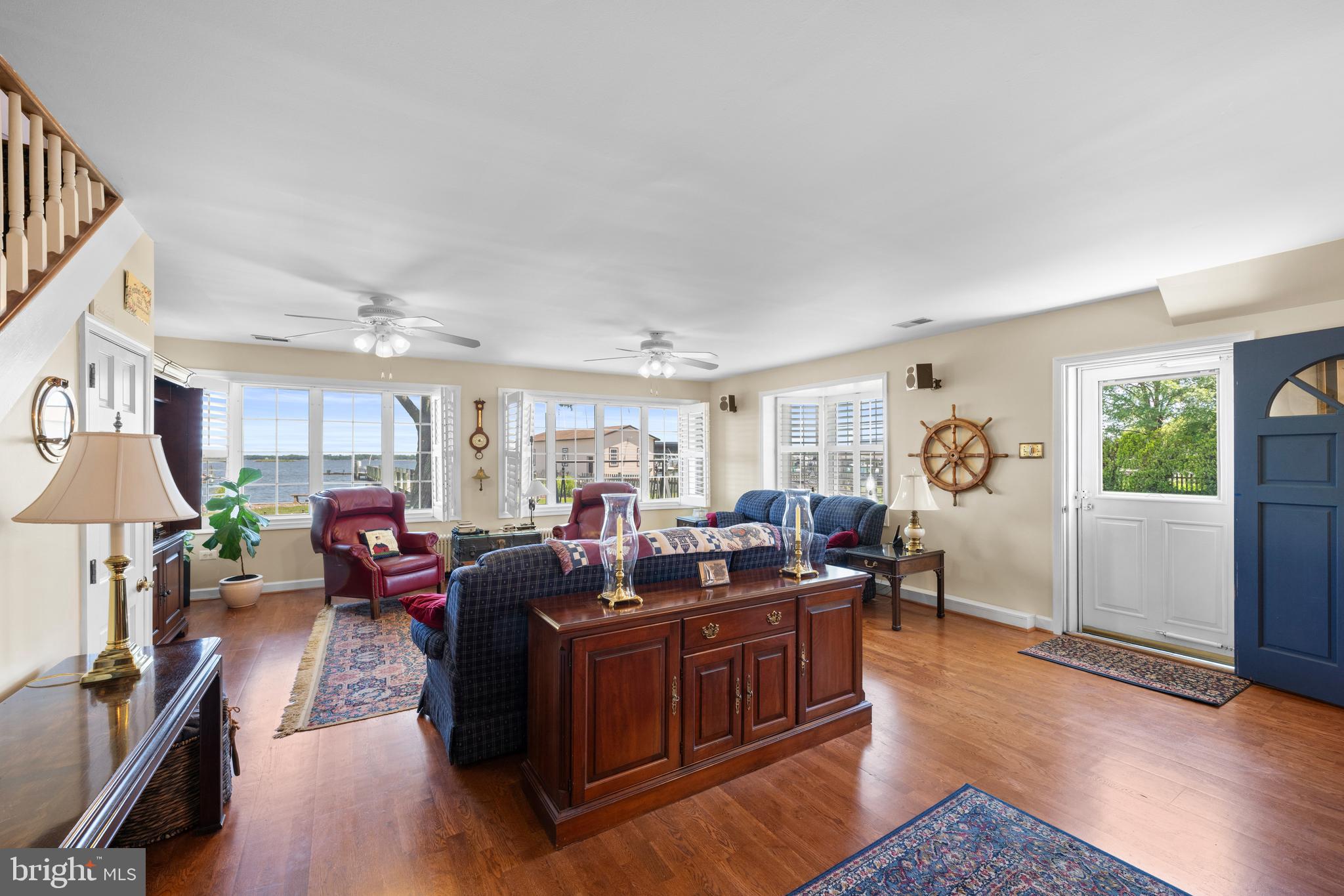 3685 1st Avenue Edgewater, MD 21037 - Photo 14 of 41 a living room with fireplace furniture and a wooden floor