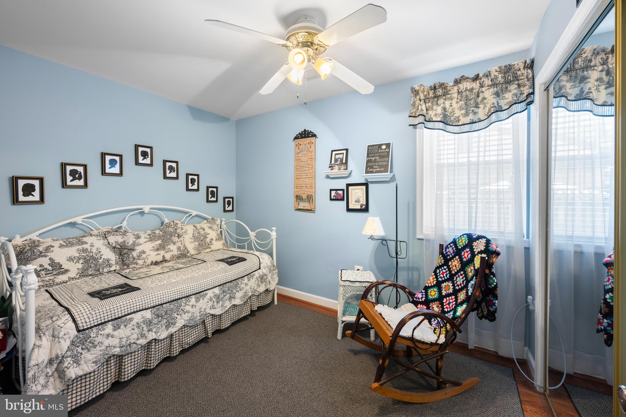 3685 1st Avenue Edgewater, MD 21037 - Photo 17 of 41 a bedroom with furniture and a chandelier