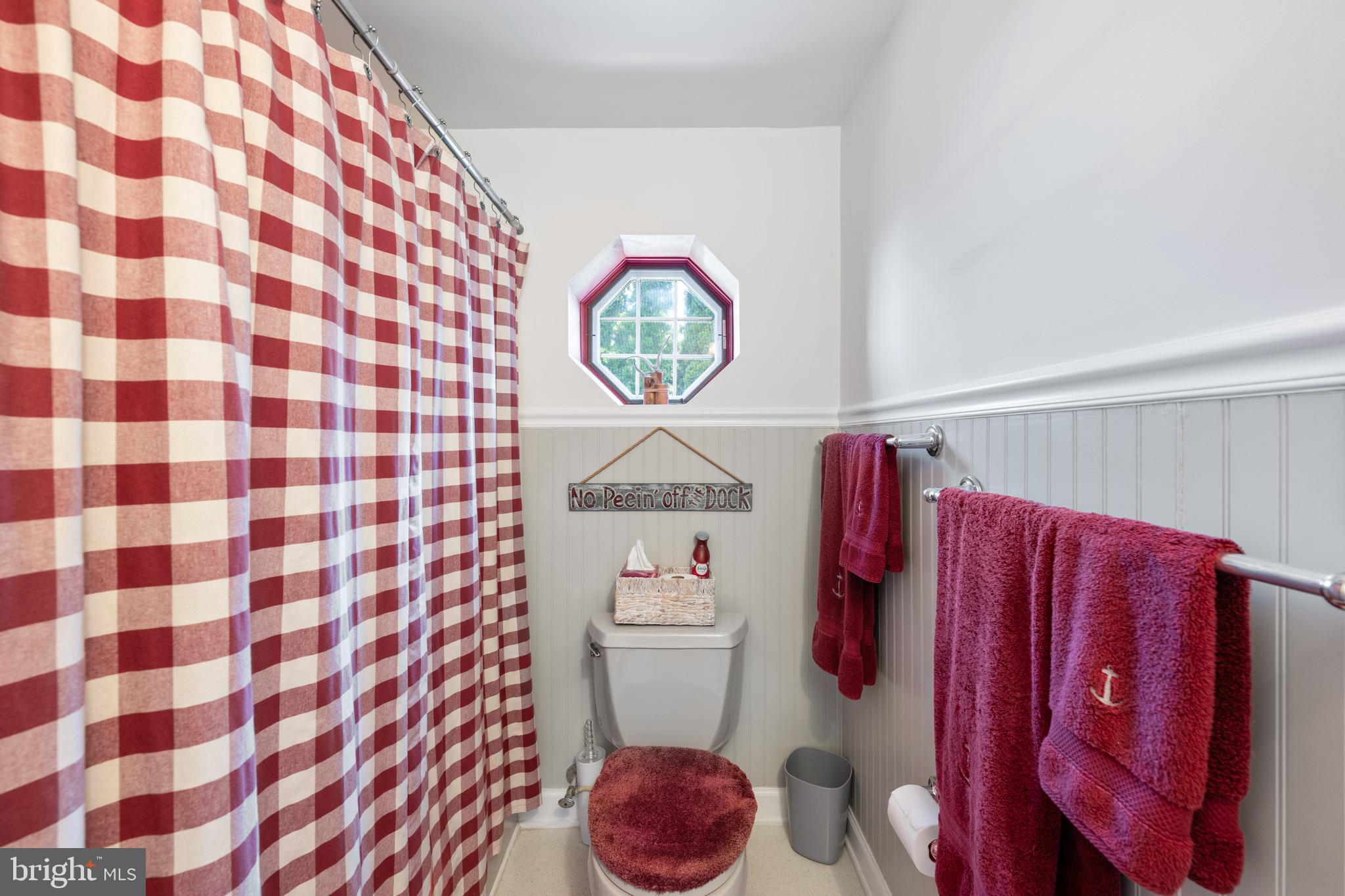 3685 1st Avenue Edgewater, MD 21037 - Photo 18 of 41 a bathroom with a toilet and a shower