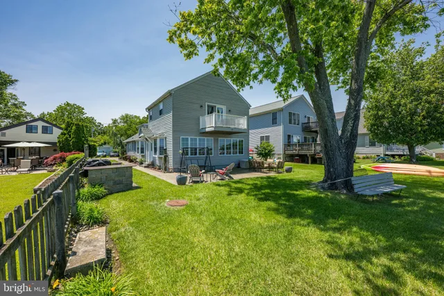 a view of swimming pool with outdoor seating