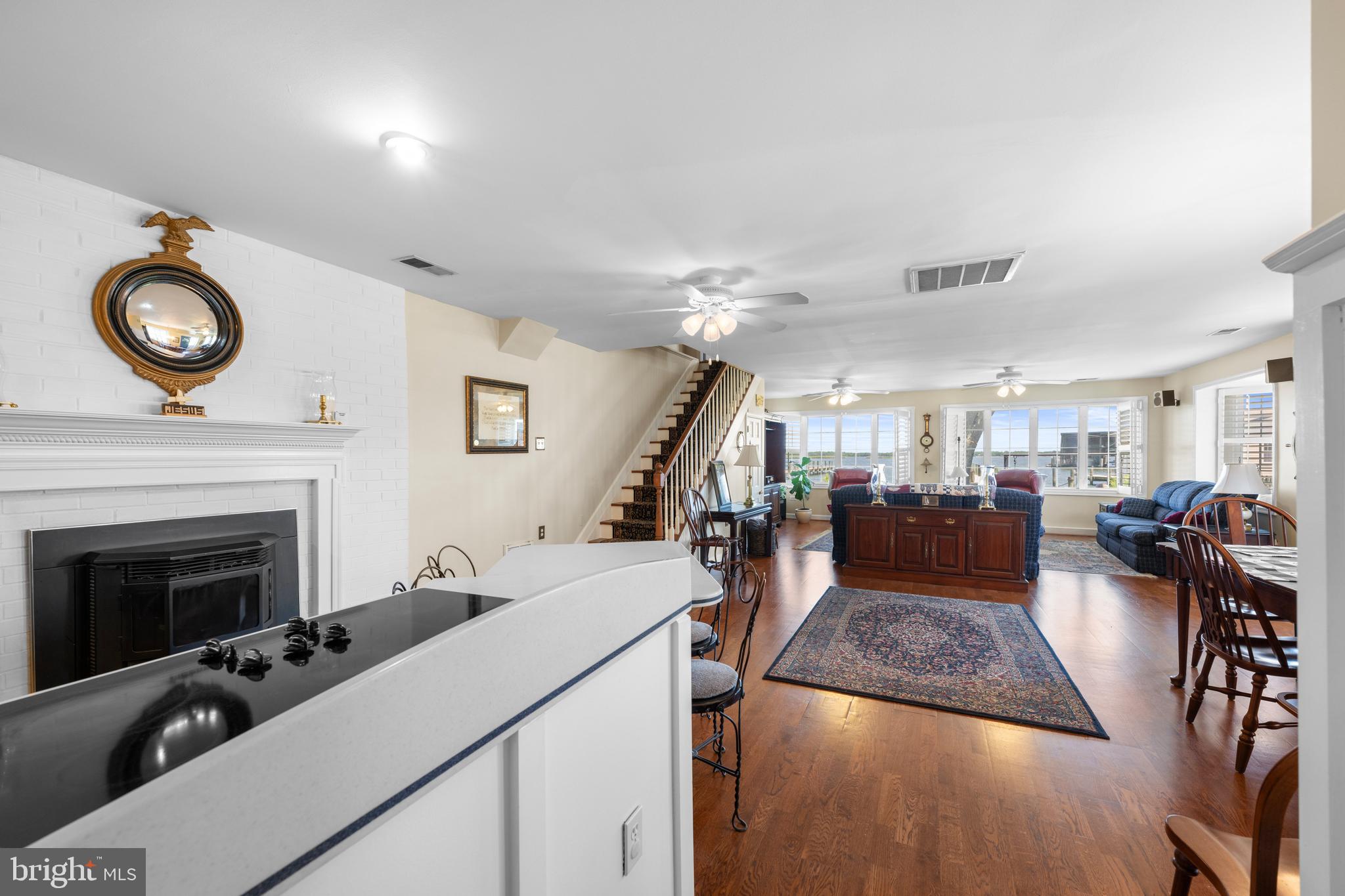 3685 1st Avenue Edgewater, MD 21037 - Photo 7 of 41 a living room with furniture and a fireplace