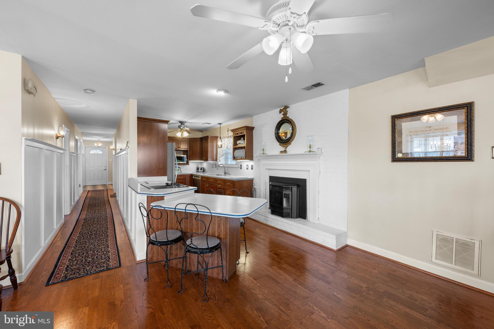 3685 1st Avenue Edgewater, MD 21037 - Photo 8 of 41 a view of a livingroom with furniture and a fireplace