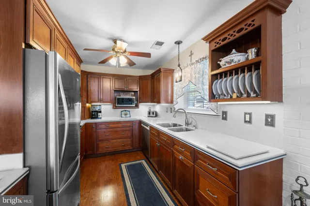a kitchen with cabinets and outdoor view