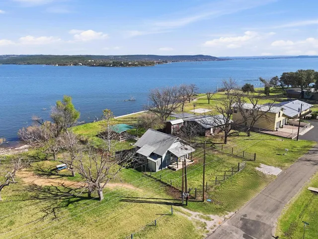 a view of swimming pool from a yard