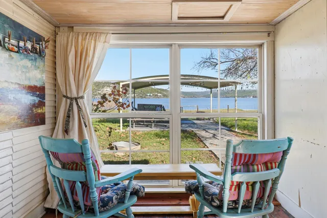 a bathroom with a toilet sink and shower