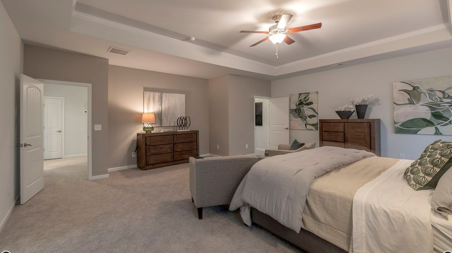 3633 Capstone Court Murfreesboro, TN 37128 - Photo 5 of 14 a bedroom with a bed and a chandelier
