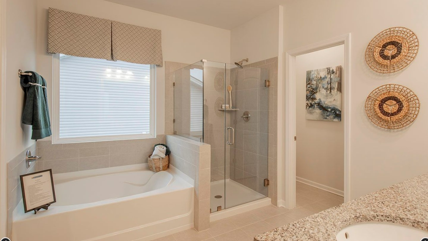 3633 Capstone Court Murfreesboro, TN 37128 - Photo 7 of 14 a bathroom with a bathtub and a shower
