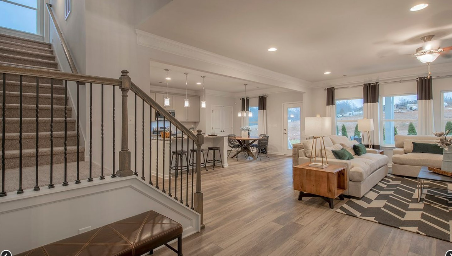 3633 Capstone Court Murfreesboro, TN 37128 - Photo 8 of 14 a living room with furniture or wooden floor and a table