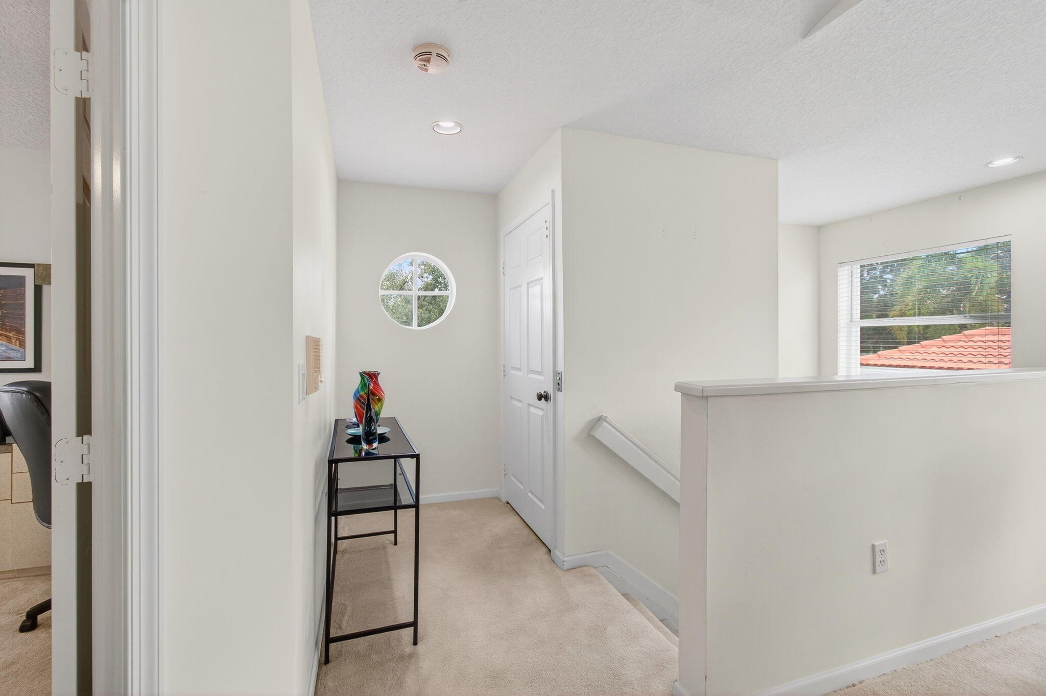 7676 Springwater Place, Unit 201 Boynton Beach, FL 33437 - Photo 7 of 36 a room that has a bed and a window in it