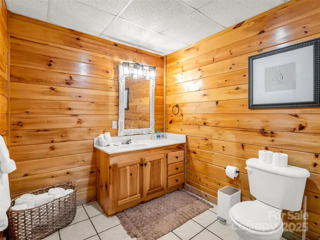 a view of two chairs in the balcony