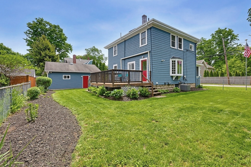 10 Water Street Natick, MA 01760 - Photo 30 of 35 a front view of house with yard and green space