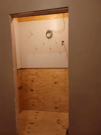 a view of a park with furniture and a fire pit