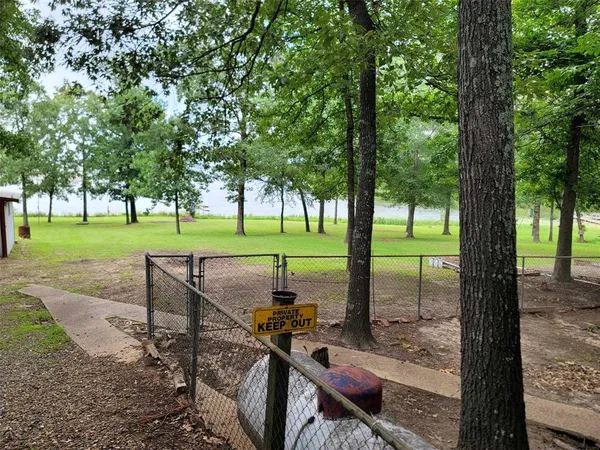 a bed sitting in a room next to a window