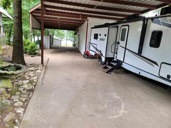 a kitchen with stainless steel appliances granite countertop a sink stove and microwave