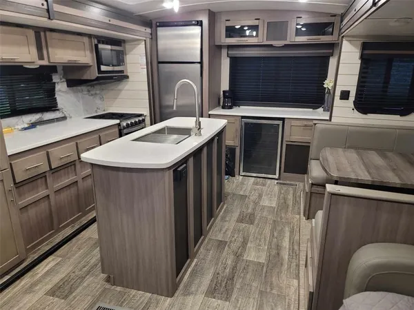 a bedroom with a bed and cabinets