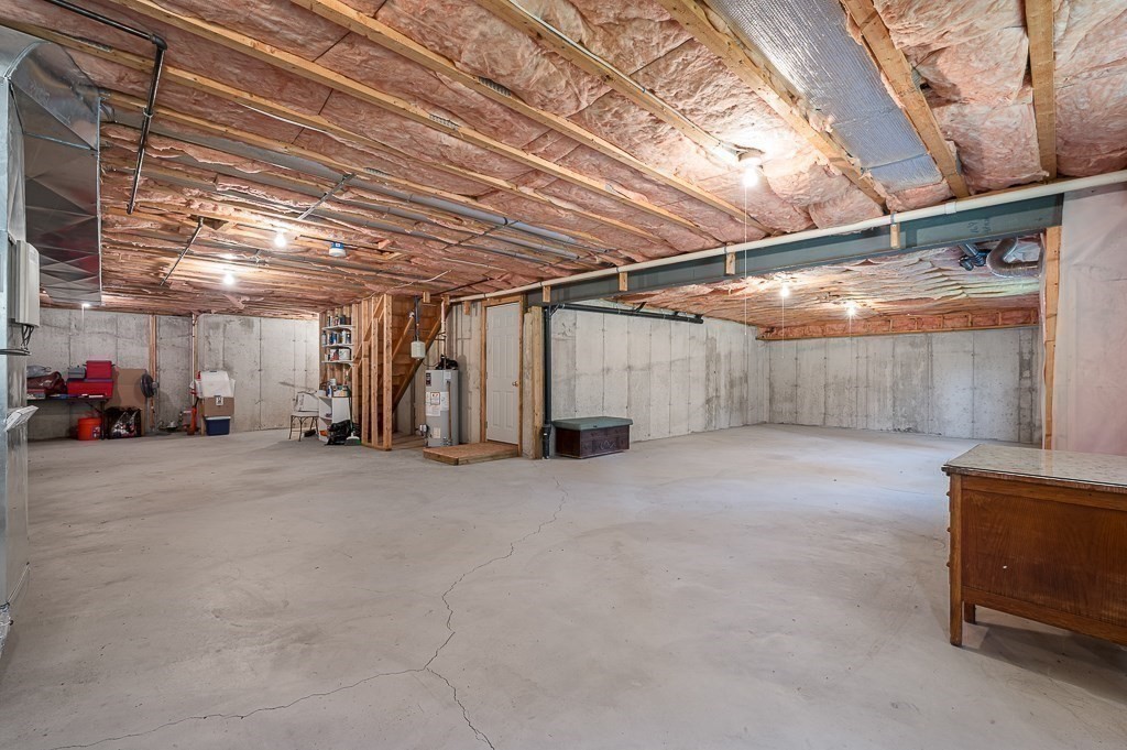 115 Ariel Circle, Unit 115 Sutton, MA 01590 - Photo 30 of 39 a view of a room with lots of stuff