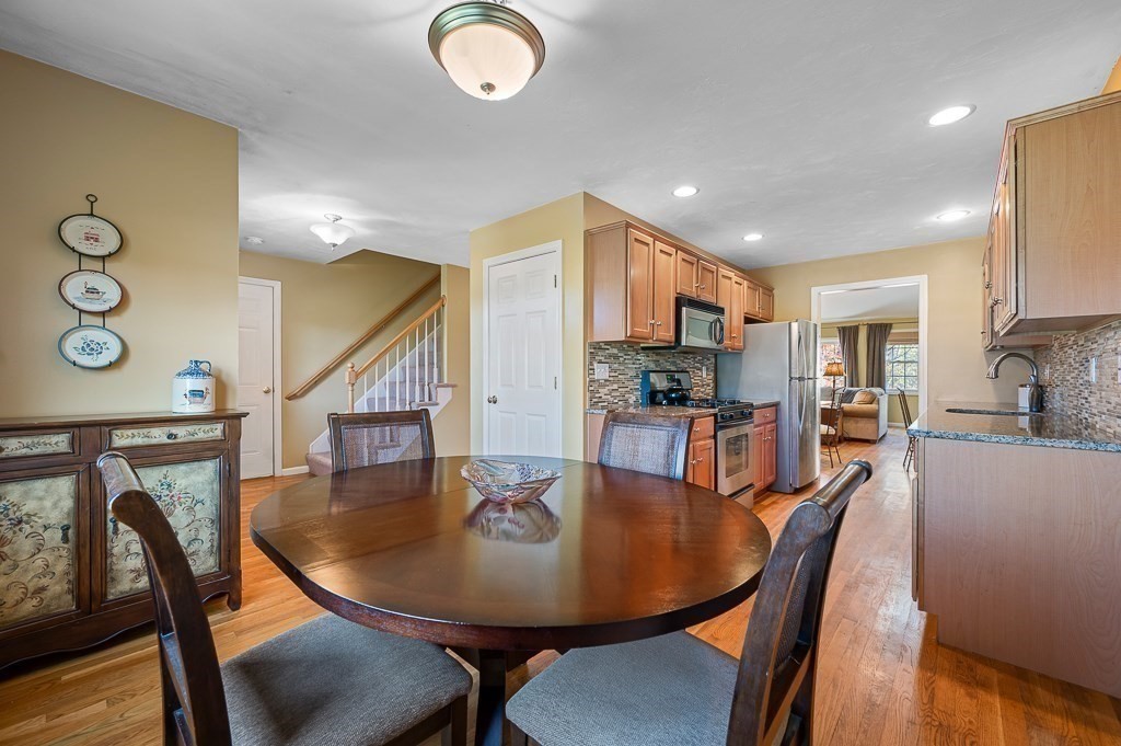 115 Ariel Circle, Unit 115 Sutton, MA 01590 - Photo 8 of 39 a view of a dining room with furniture