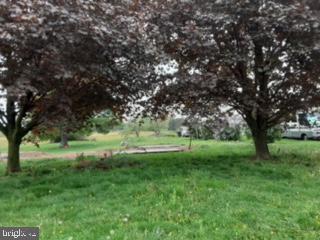 12635 Spickler Road Clear Spring, MD 21722 - Photo 1 of 4 a view of grassy field with trees
