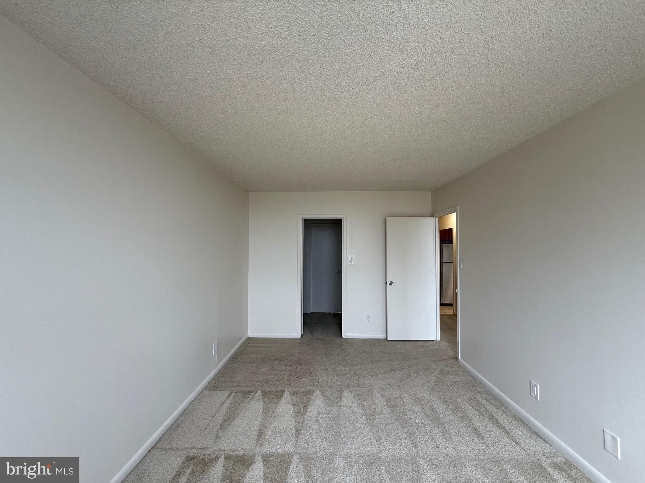 5225 Pooks Hill Road, Unit 1517N Bethesda, MD 20814 - Photo 8 of 30 a view of an empty room and window