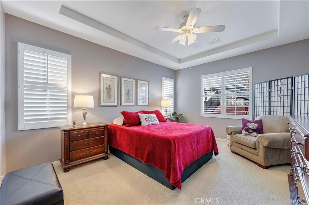 27956 Crystal Spring Drive Menifee, CA 92584 - Photo 13 of 25 a bedroom with a bed and a couch