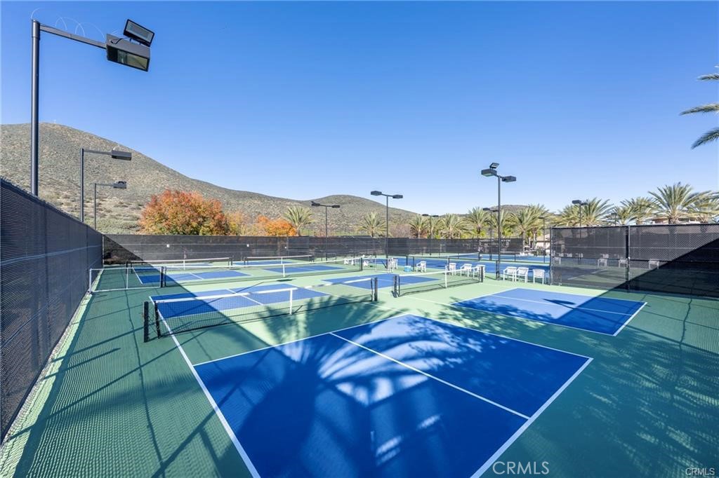 27956 Crystal Spring Drive Menifee, CA 92584 - Photo 24 of 25 a view of a swimming pool with a terrace