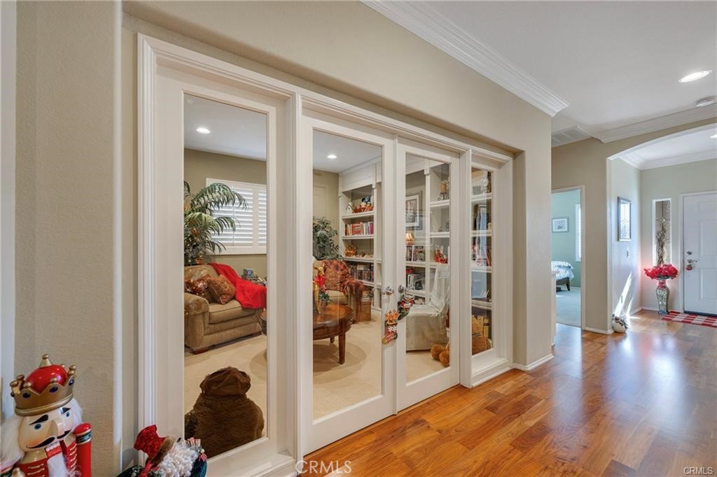 27956 Crystal Spring Drive Menifee, CA 92584 - Photo 5 of 25 a view of a room with wooden floor and closet