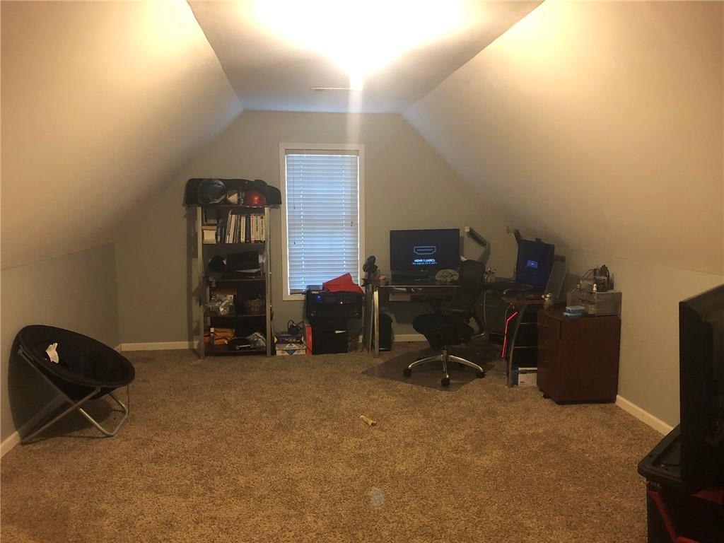 848 Windy Mill Court Temple, GA 30179 - Photo 17 of 19 a view of a room with gym equipment