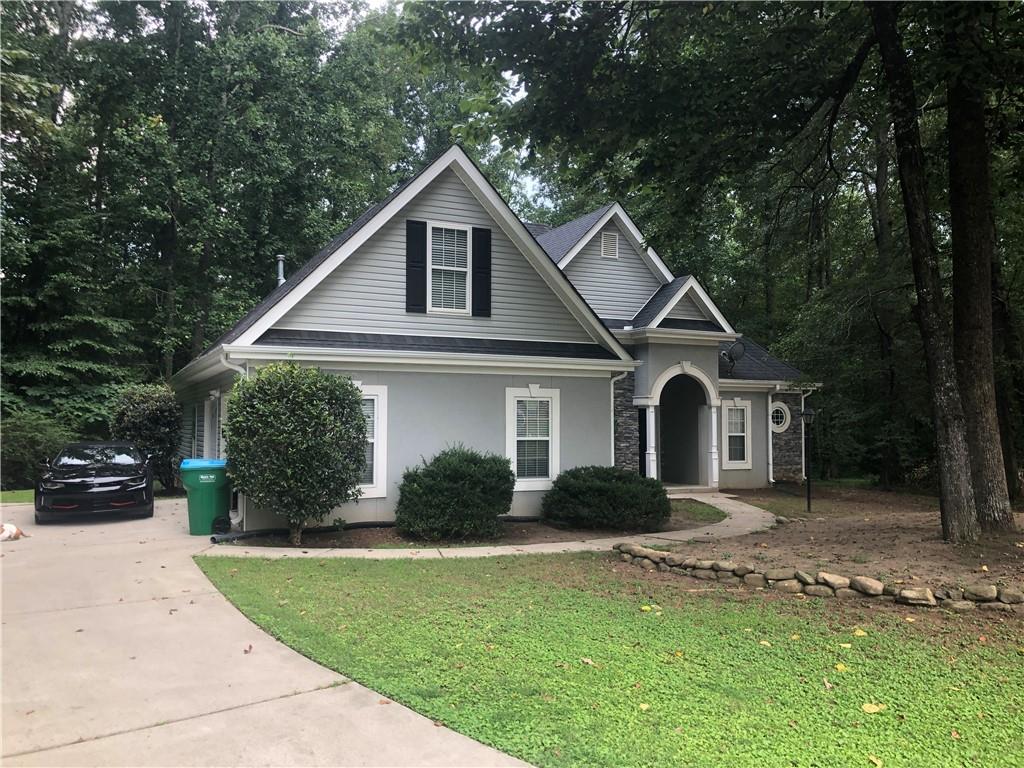 848 Windy Mill Court Temple, GA 30179 - Photo 2 of 19 a front view of a house with a yard