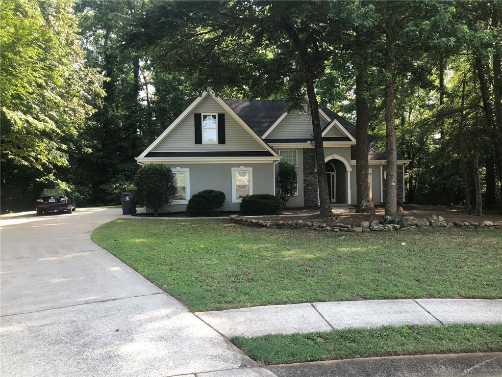 848 Windy Mill Court Temple, GA 30179 - Photo 6 of 19 a front view of a house with a yard