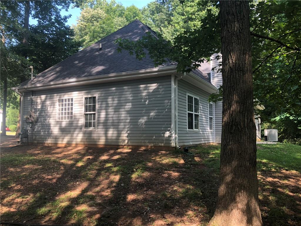 848 Windy Mill Court Temple, GA 30179 - Photo 7 of 19 a backyard of a house with lots of green space