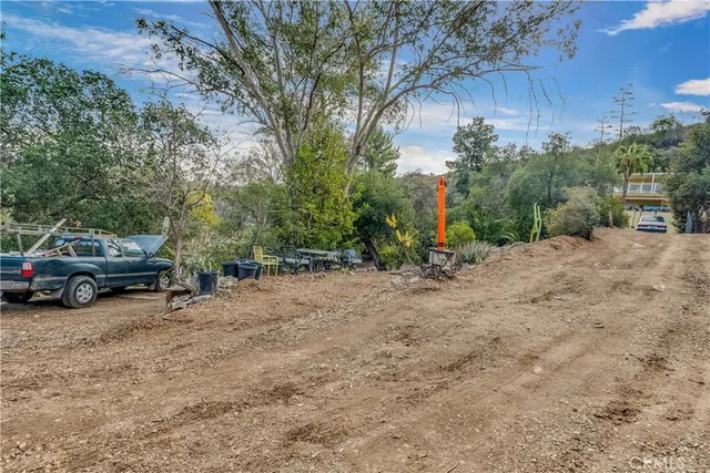 a view of a car parked in front of a house