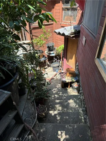 a view of a backyard of a house