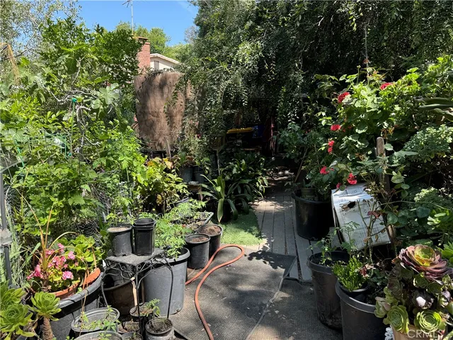 a view of storage and utility room with a refrigerator