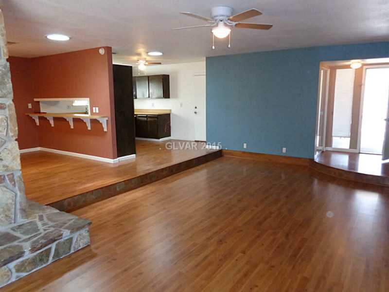 225 South Roland Wiley Las Vegas, NV 89145 - Photo 2 of 14 Living Room. LIVING, DINING, KITCHEN ALL OPEN