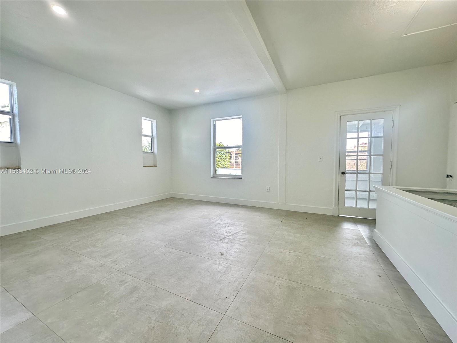 an empty room with windows