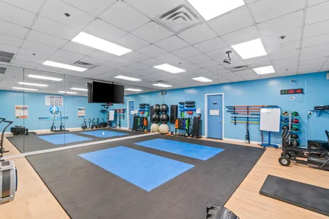 a view of a room with gym equipment