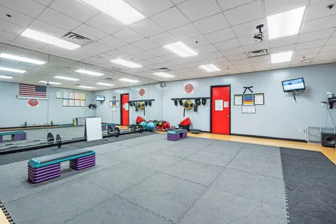 a view of a swimming pool with a lounge chair