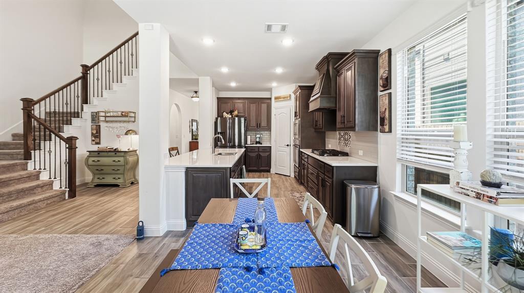 5216 Troupe Road McKinney, TX 75071 - Photo 11 of 40 Breakfast nook and kitchen.